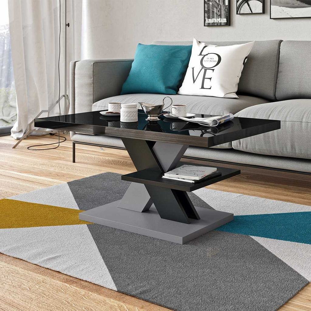 Modern coffee table featuring an all-black high gloss tabletop and stylish gray legs for a contemporary touch. Sleek living room furniture, glossy surface, minimalist design, and versatile gray accents