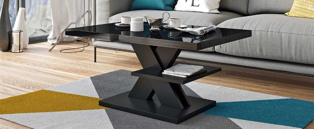 Sleek all-black coffee table with a high gloss tabletop, contemporary design, and minimalist aesthetic. Stylish living room furniture, glossy surface, and modern monochrome decor.