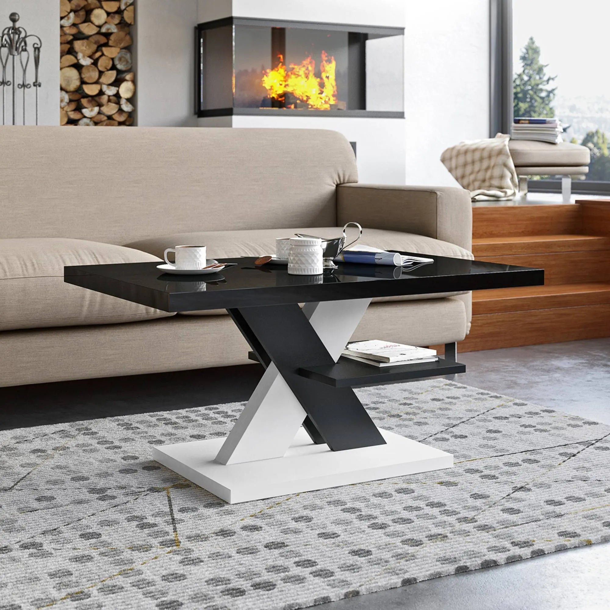 A modern black and white coffee table placed in a cozy living room with a fireplace and beige sofa.